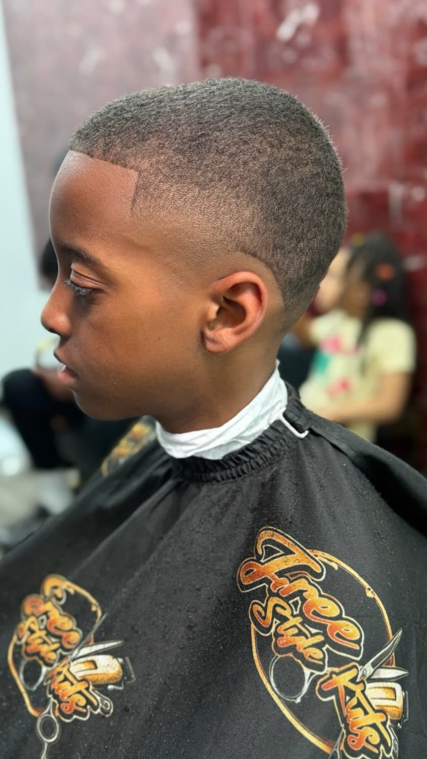 Young client with a clean burr cut